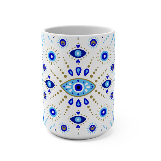 White mug with blue and gold eye pattern on a white background