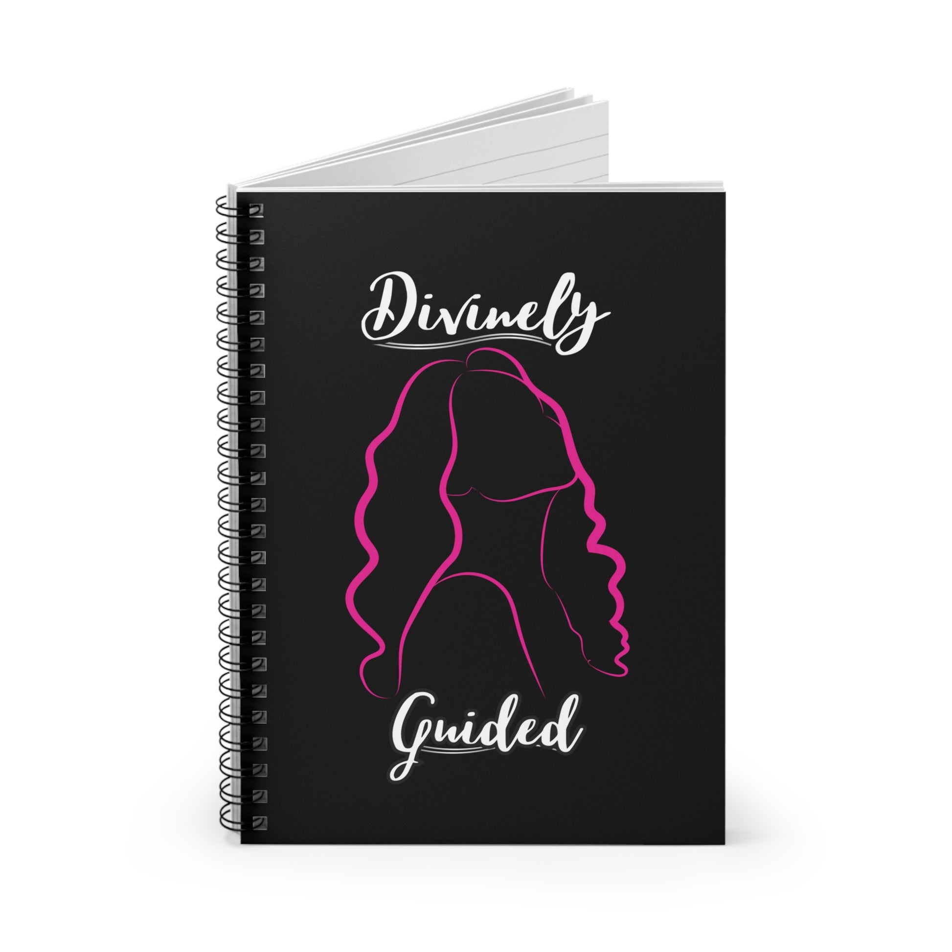 Black notebook with a pink silhouette of a woman's head and the text 'Divinely Guided' on a white background