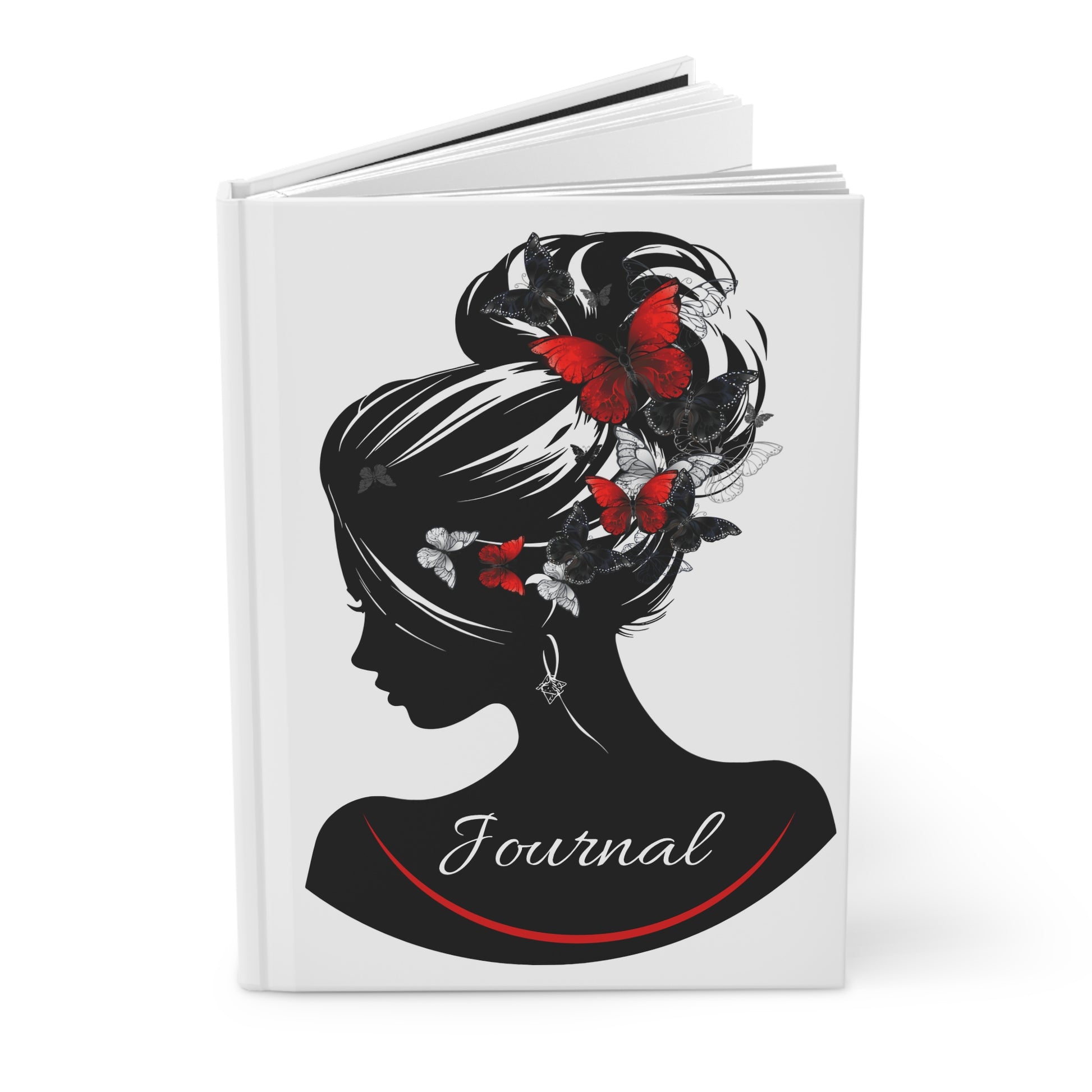 Journal with a black silhouette of a woman's head with butterflies on a white background