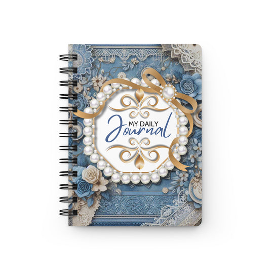 Decorative journal with floral and pearl design on a white background