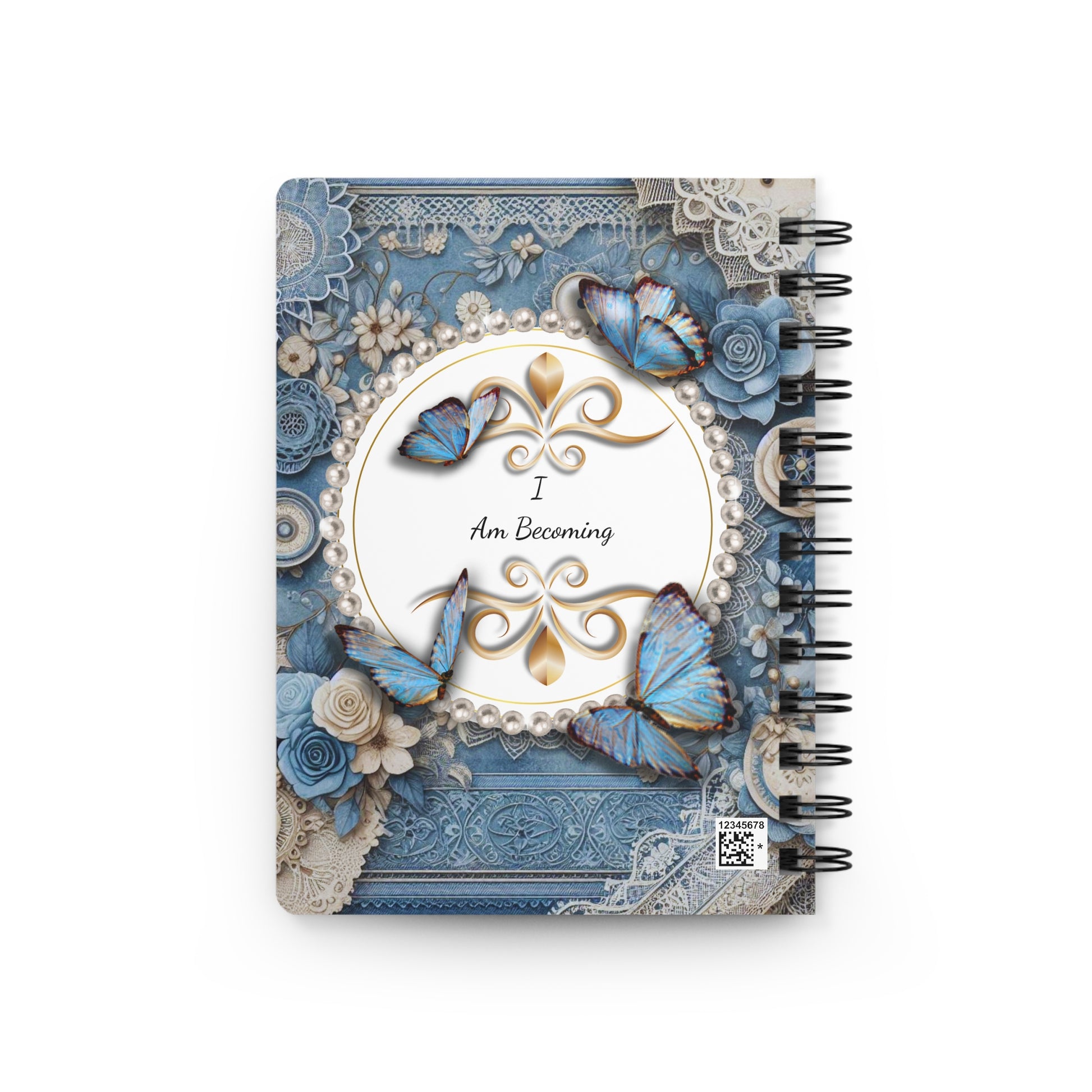 Decorative notebook with floral and butterfly design on a white background