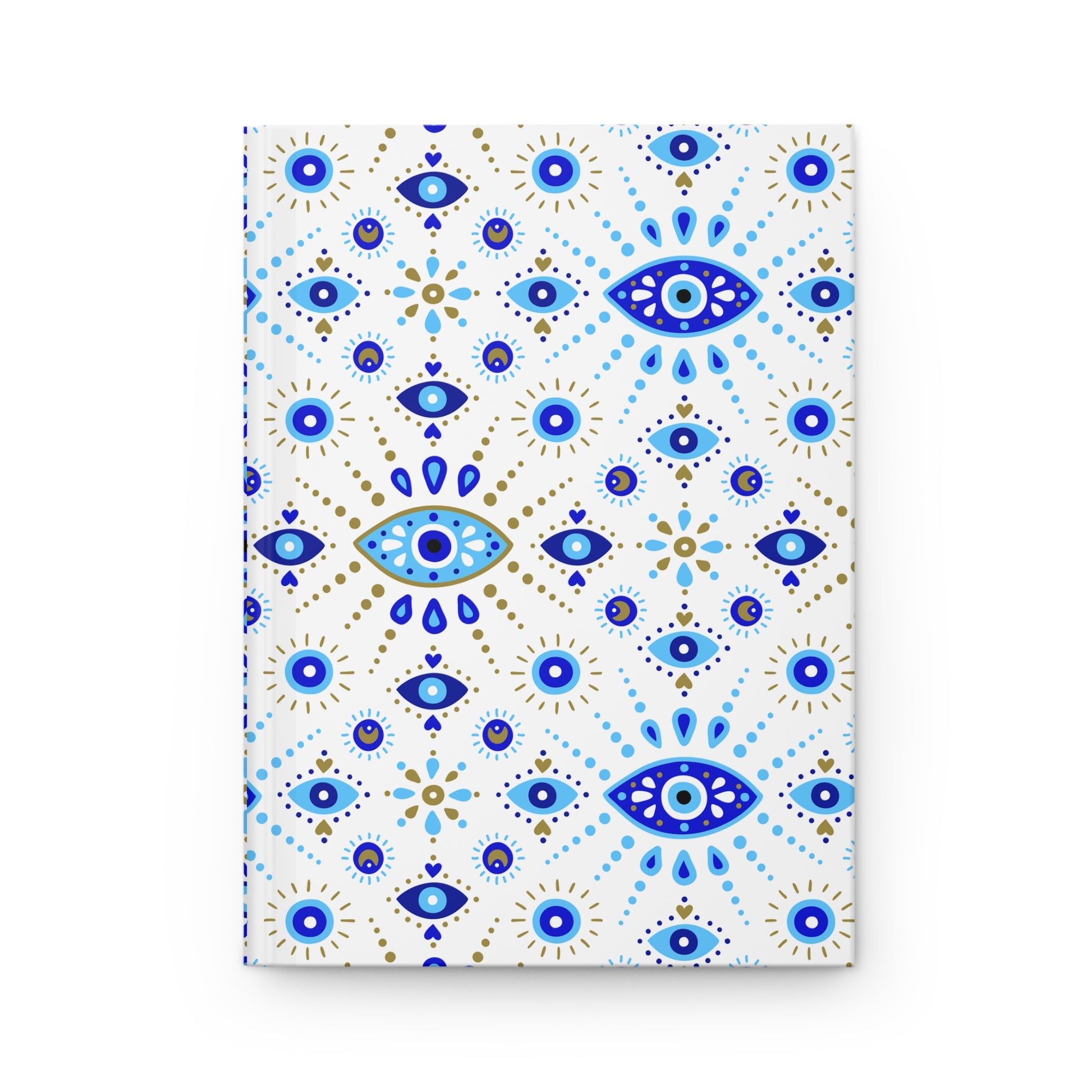 Notebook with blue and gold eye pattern on a white background