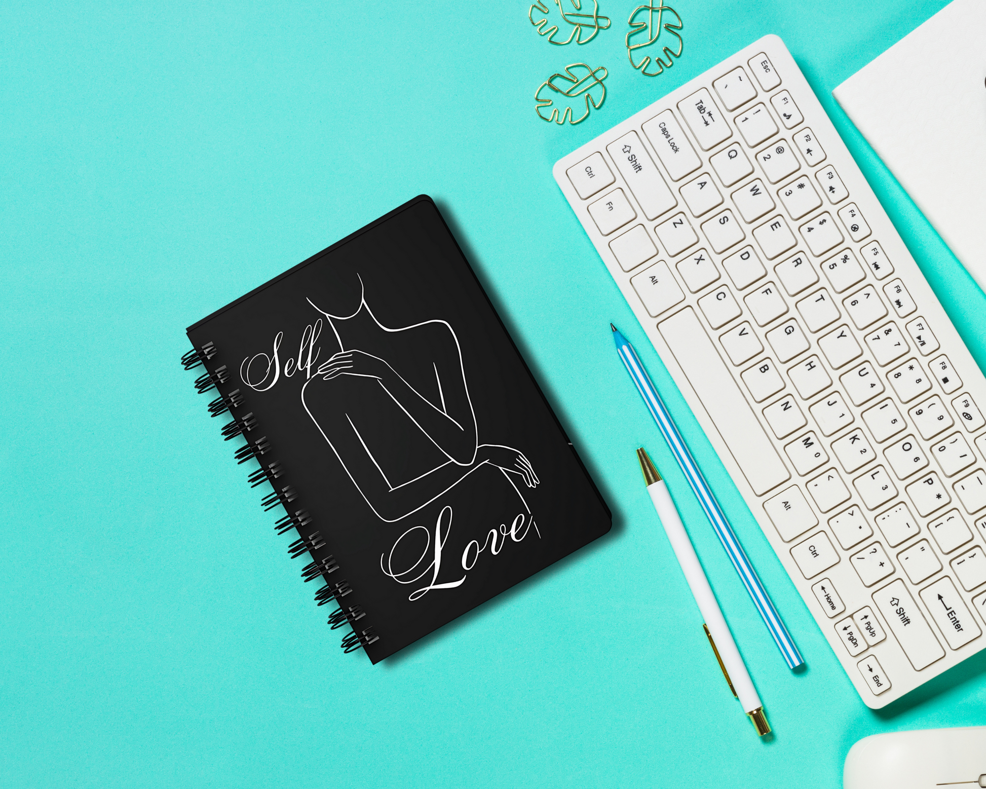 Chic spiral notebooks with black background and luxurious gold feminine illustrations"