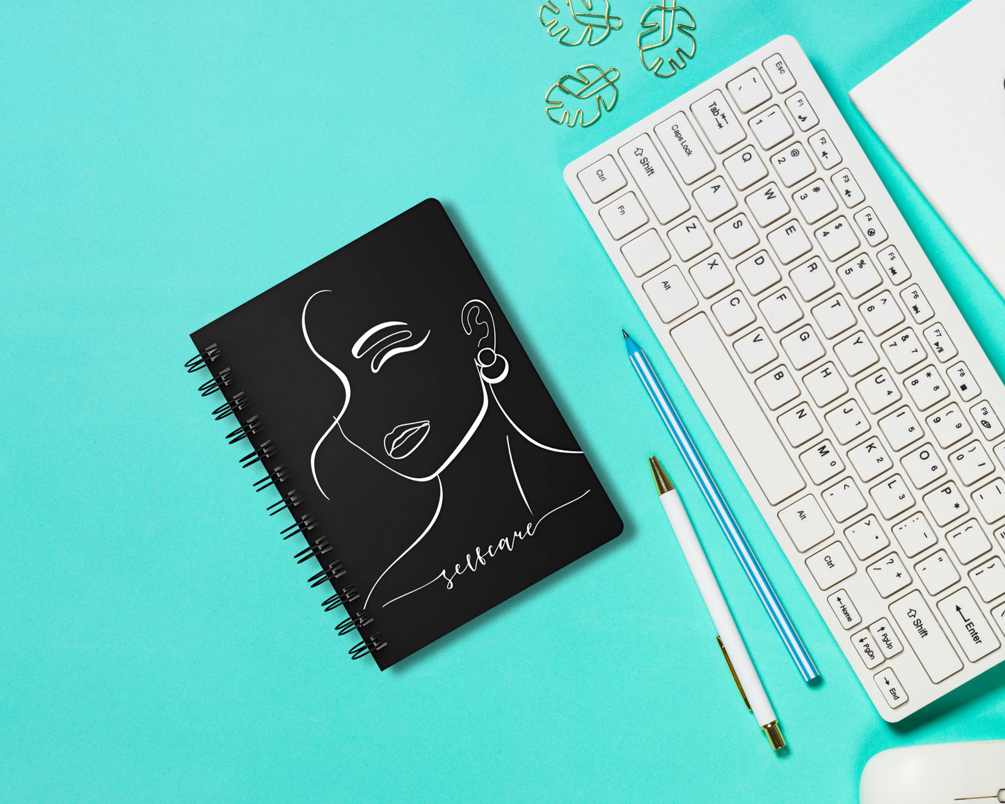 Stylish feminine journals with white line illustrations and motivational words for women